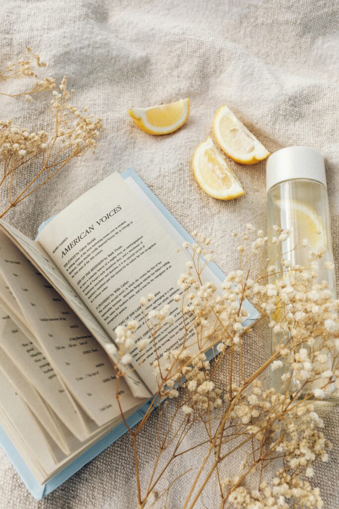 A book, picturesque lemons, and lots of love combine together to form an aesthetic and loving image
